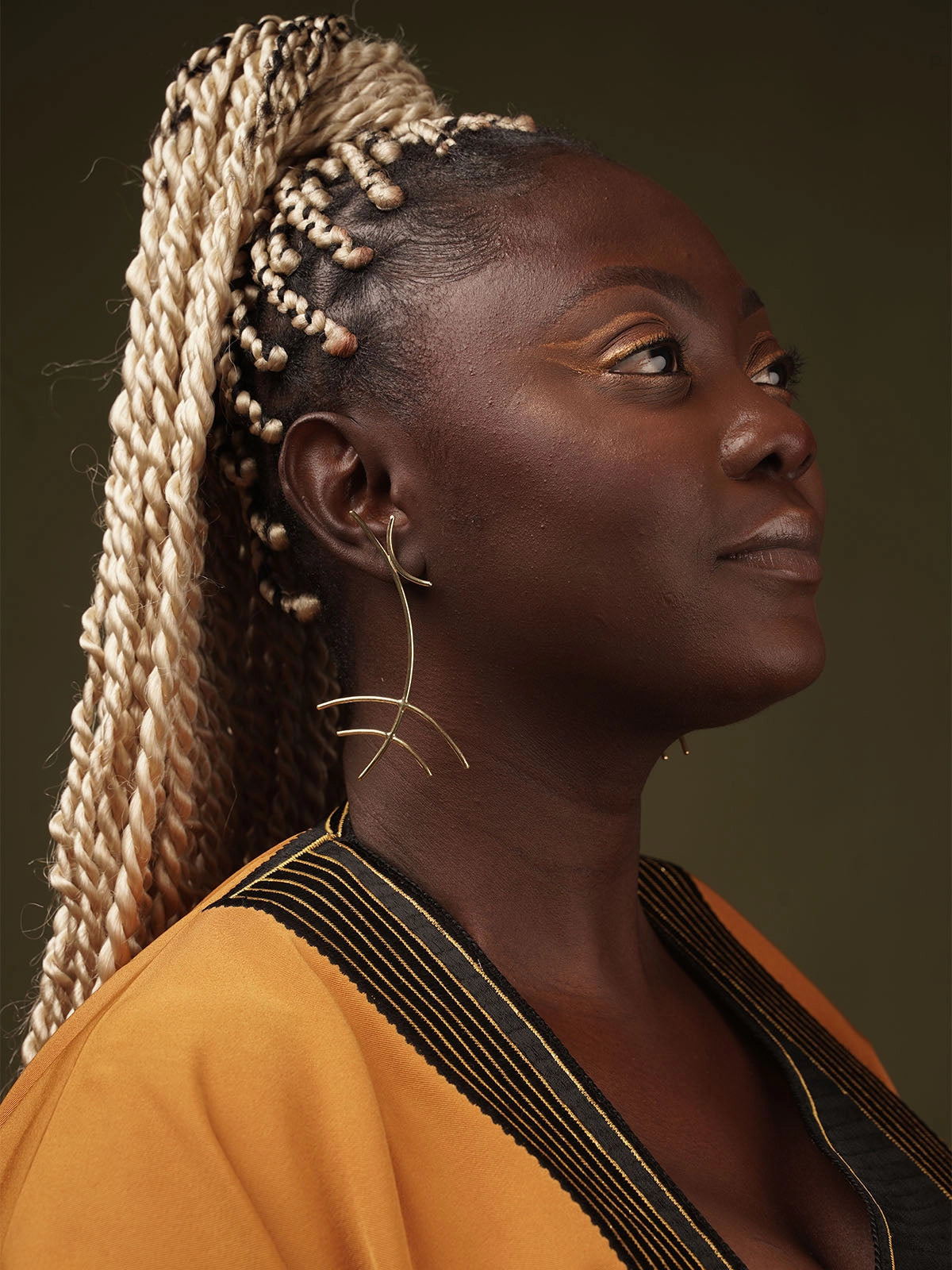 Boucles drama bronze fait main senegal afrique artisanat design