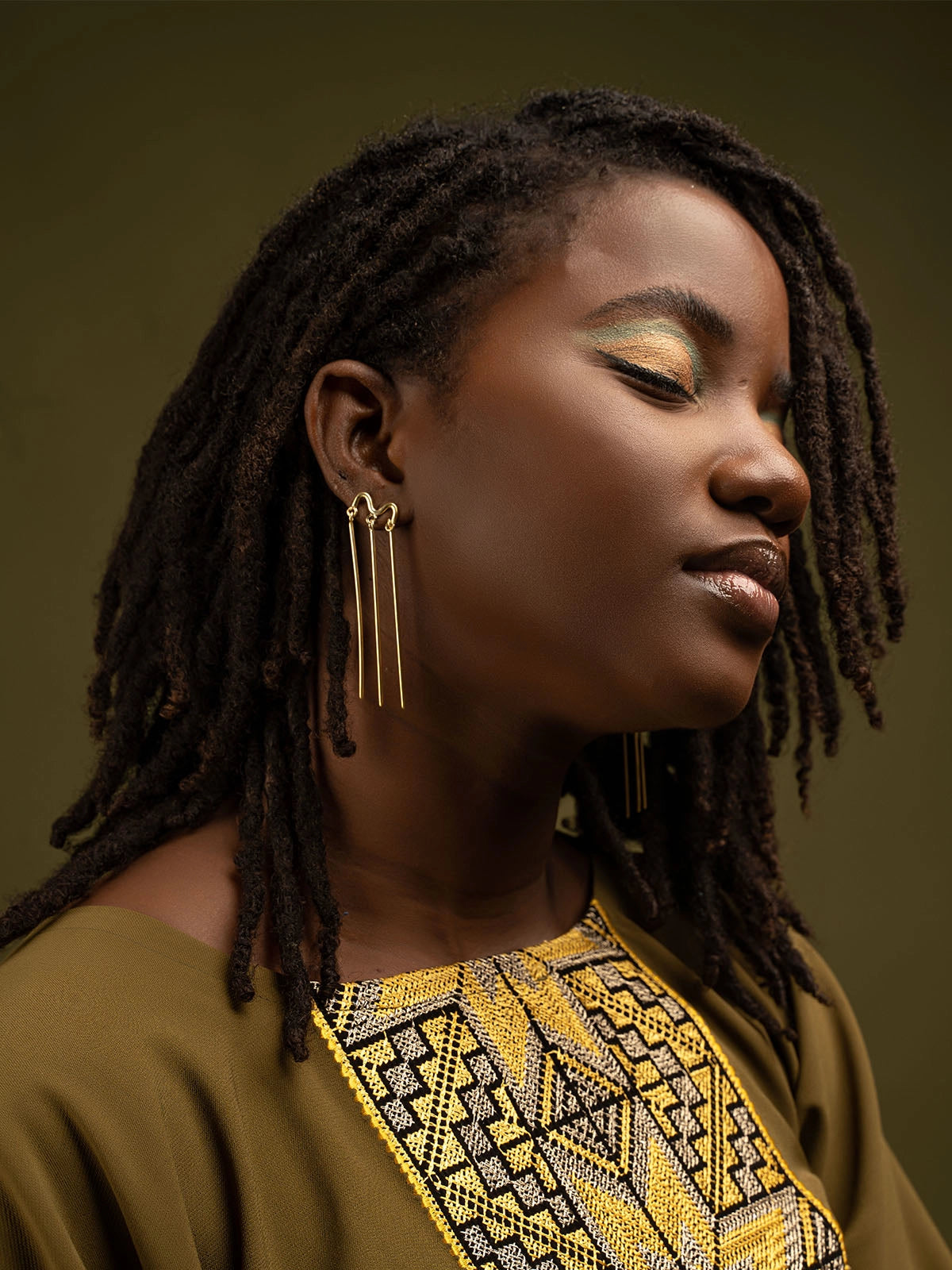 Boucles lova bronze artisanat senegal afrique design faitmain