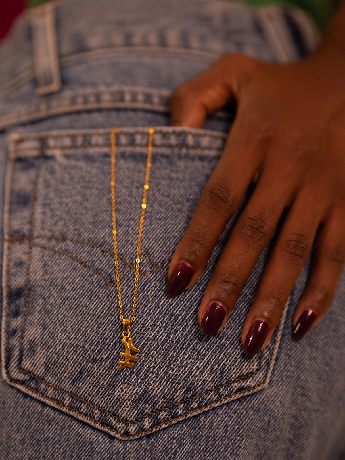 pendentif drama bronze artistanat bijouterie afrique senegal faitmain