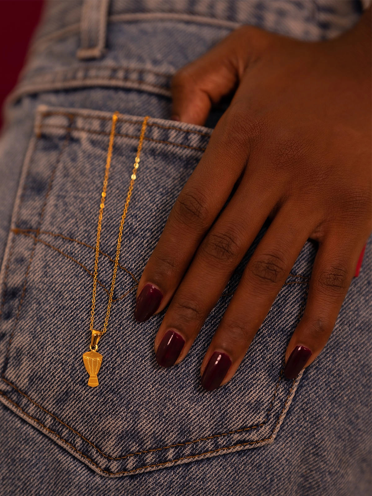pendentif tamtam bronze artistanat bijouterie afrique senegal faitmain