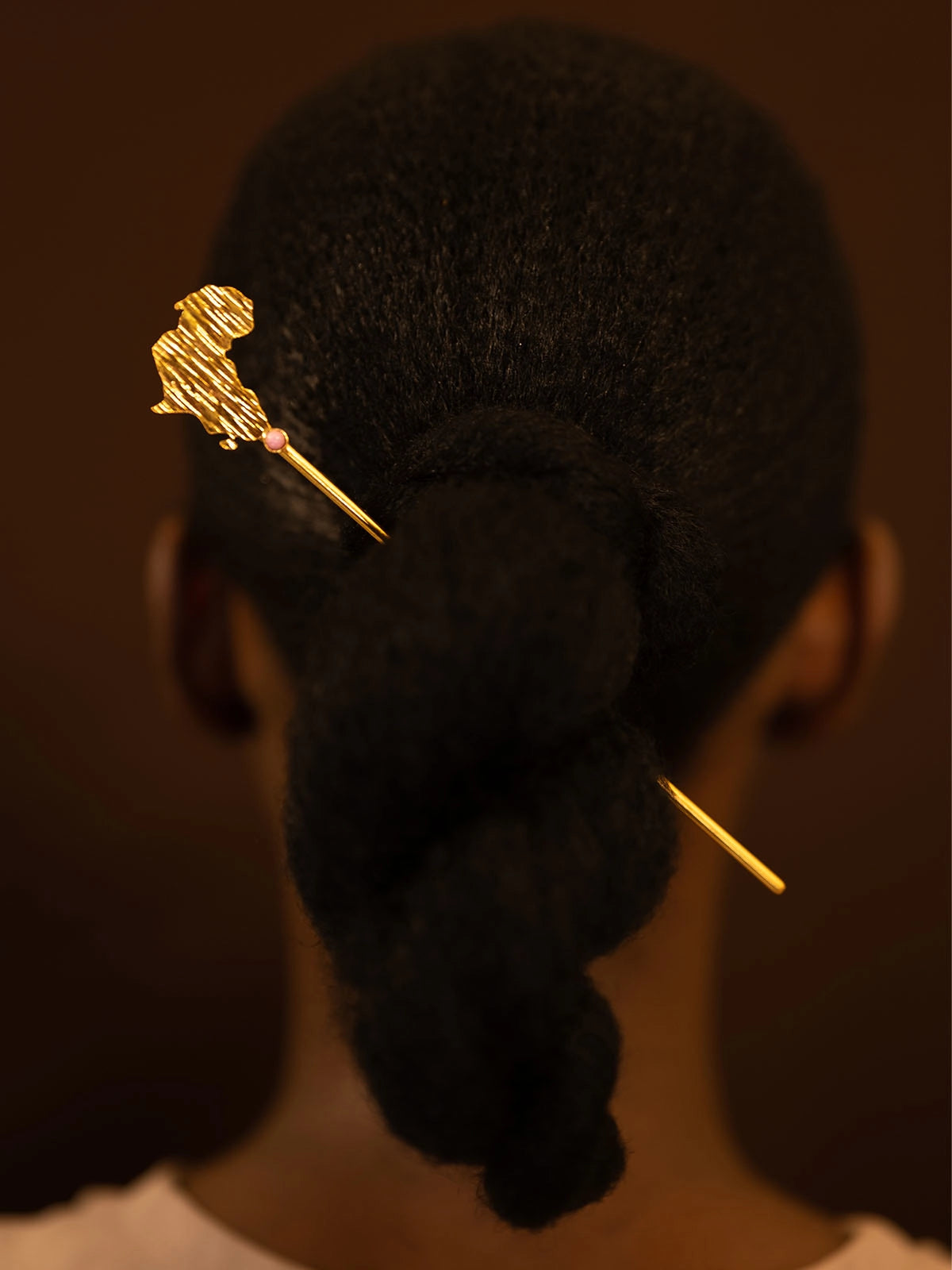 pic mother pierre cheveux bronze artistanat bijouterie afrique senegal faitmain