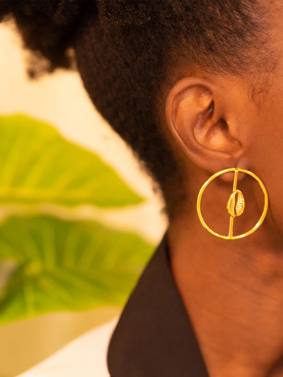 Boucles cauri bronze design artisanat senegal fait main afrique