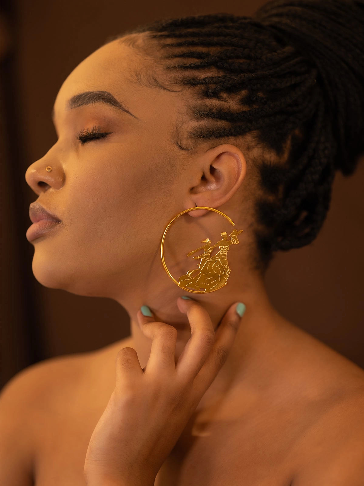 Boucles renaissance standard bronze design faitmain artisanat afrique senegal