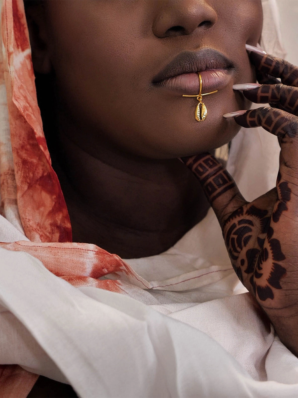lips cauri bronze artistanat bijouterie afrique senegal faitmain