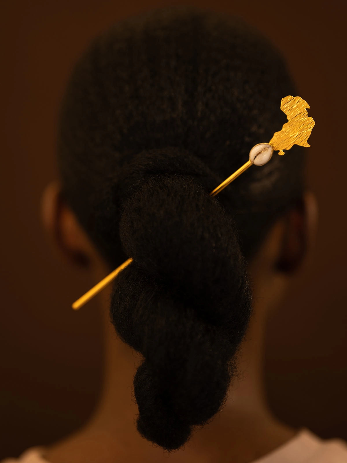 pic mother cauri cheveux bronze artistanat bijouterie afrique senegal faitmain